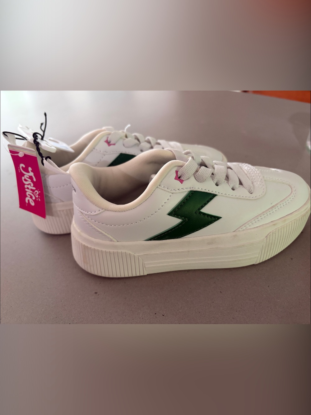 White Sneakers with Green Lightning Accent